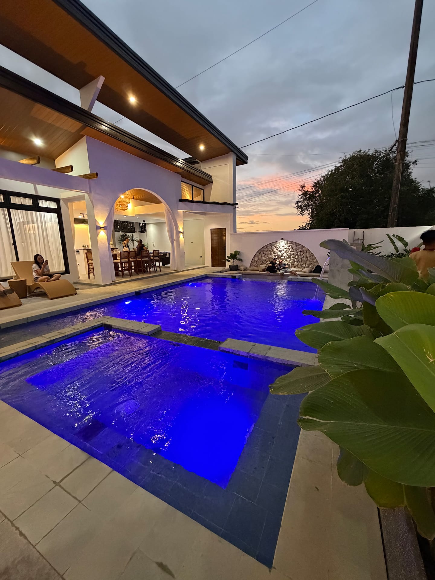 Casa Francho pool area illuminated at dusk